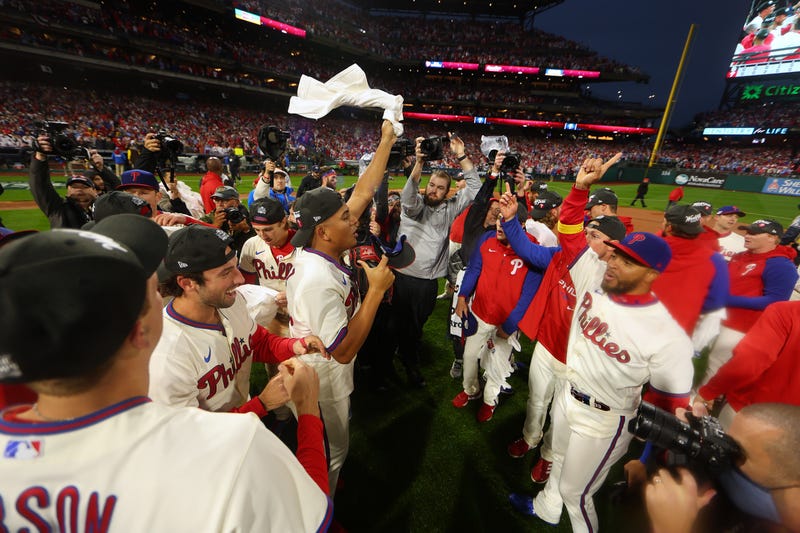 Members of the Philadelphia Phillies celebrate after defeating the San Diego Padres in game five to win the National League Championship Series at Citizens Bank Park on October 23, 2022 in Philadelphia, Pennsylvania.