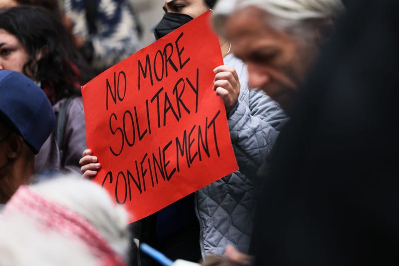People gather for a rally to protest the 17th death on Rikers Island at City Hall on October 25, 2022 in New York City. 