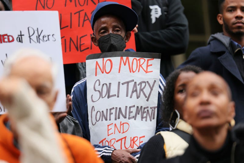 : People gather for a rally to protest the 17th death on Rikers Island at City Hall on October 25, 2022 in New York City.