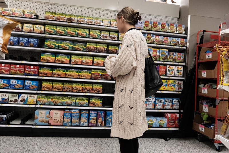 People shop for groceries in a Manhattan store on October 26, 2022 in New York City. Inflation, in the form of higher prices for gas, food, and other consumer goods is one of the dominant issues on voters' minds as the country heads into the midterm elections on November 8. (Photo by Spencer Platt/Getty Images)