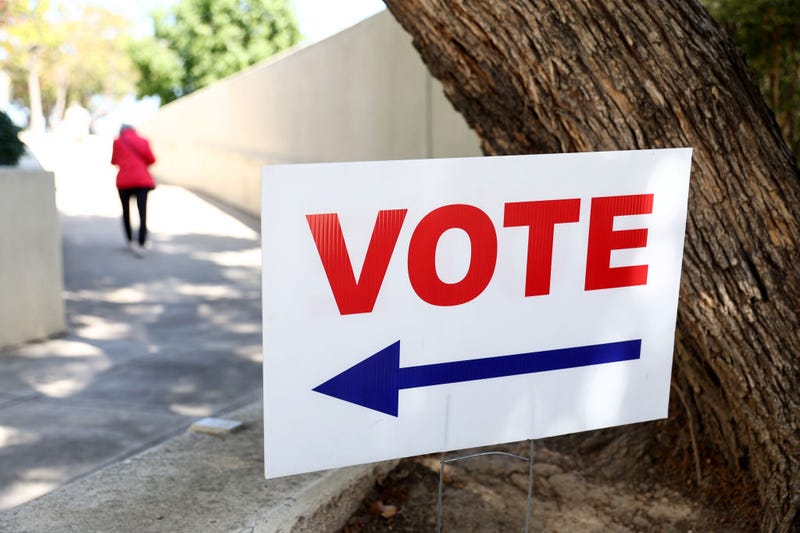 Vote here sign