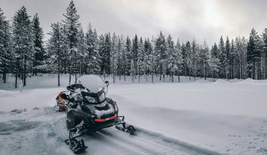 Wisconsin man crashes into trail groomer and dies while snowmobiling in the Upper Peninsula.