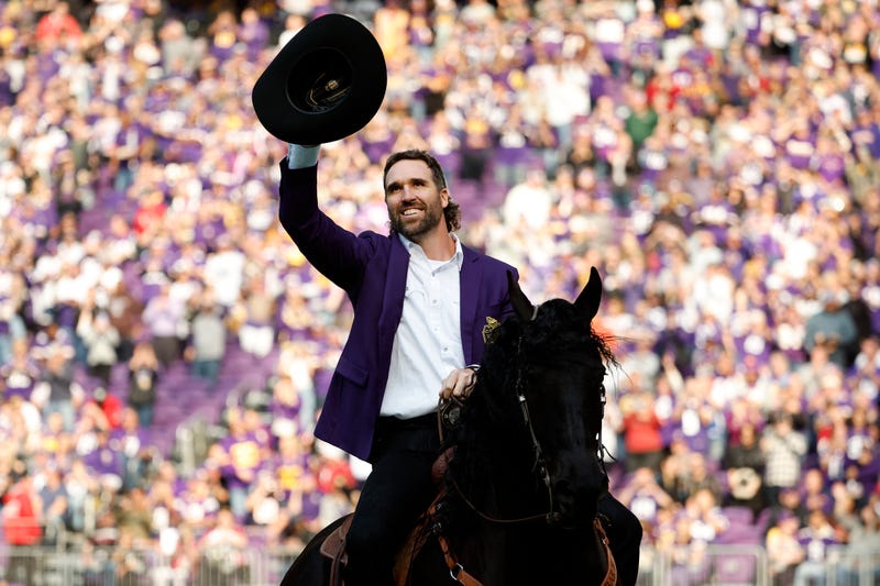 Jared Allen, former defensive end of the Minnesota Vikings, celebrates as he is inducted into the Vikings' Ring of Honor during halftime at U.S. Bank Stadium on October 30, 2022 in Minneapolis, Minnesota.