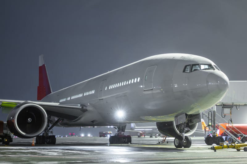wide body passenger airliner at the airport apron
