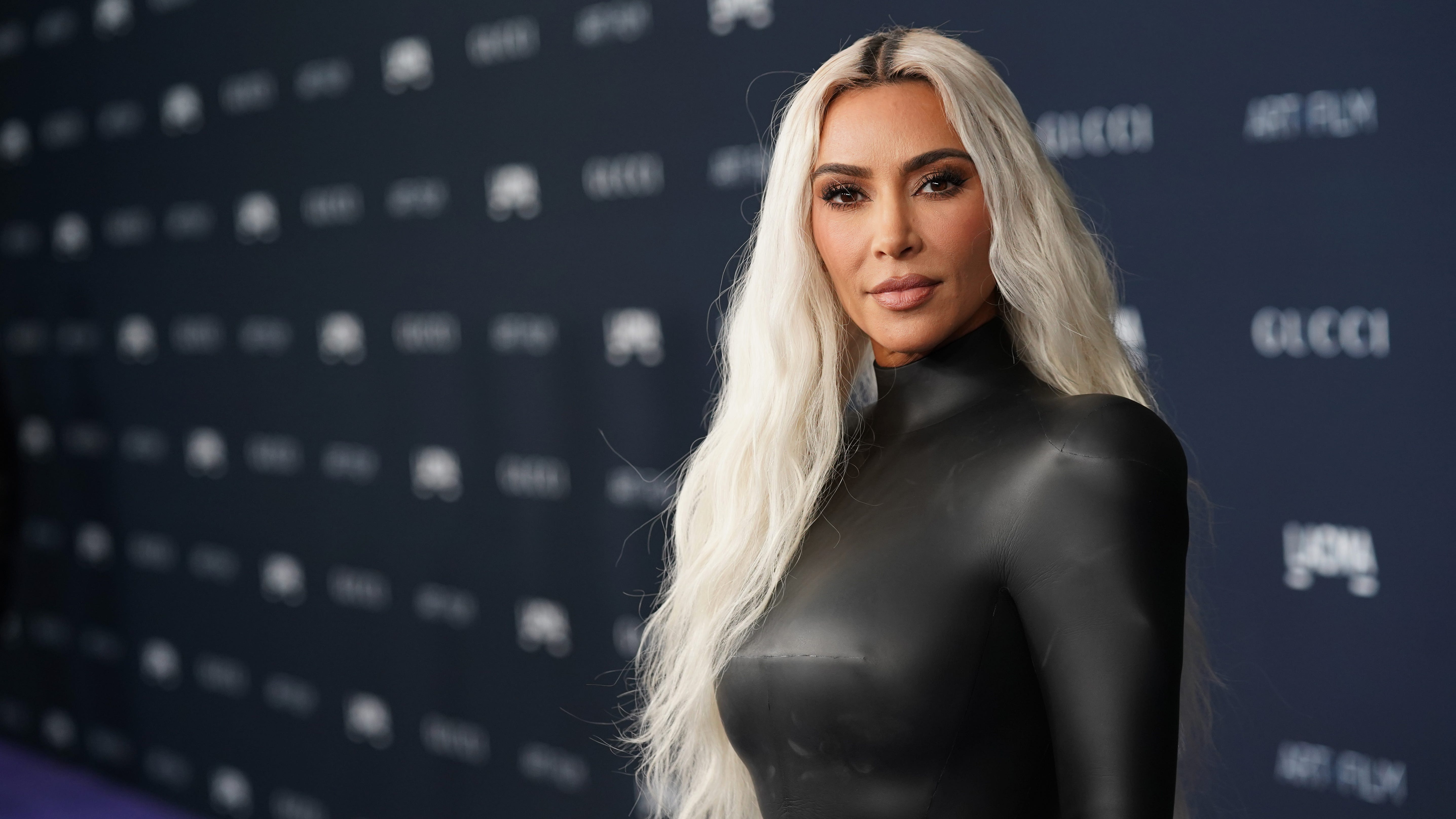 Kim Kardashian channels pink Power Ranger in form-fitting catsuit