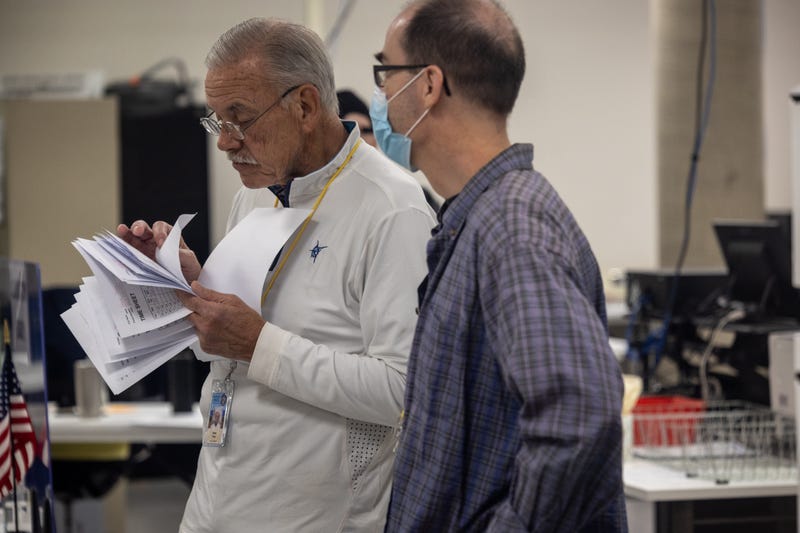 Election workers staff the Maricopa County Tabulation and Election Center on November 08, 2022 in Phoenix, Arizona. Bill Gates, Chairman of the Maricopa Board of Supervisors, said that about 20 percent of polling stations in the county have had tabulation machine malfunctions, where some ballots cannot be read. These ballots, he said, are being set aside for tabulation at the central election center in the evening after the polls close. After months of candidates campaigning, Americans are voting in the midterm elections to decide close races across the nation.