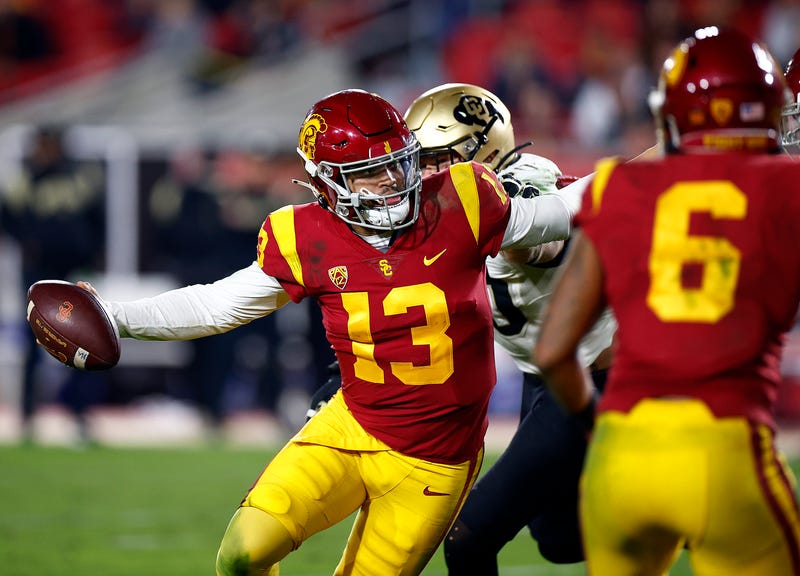Caleb Williams #13 of the USC Trojans runs the ball against the Colorado Buffaloes in the second half at United Airlines Field at the Los Angeles Memorial Coliseum on November 11, 2022 in Los Angeles, California.
