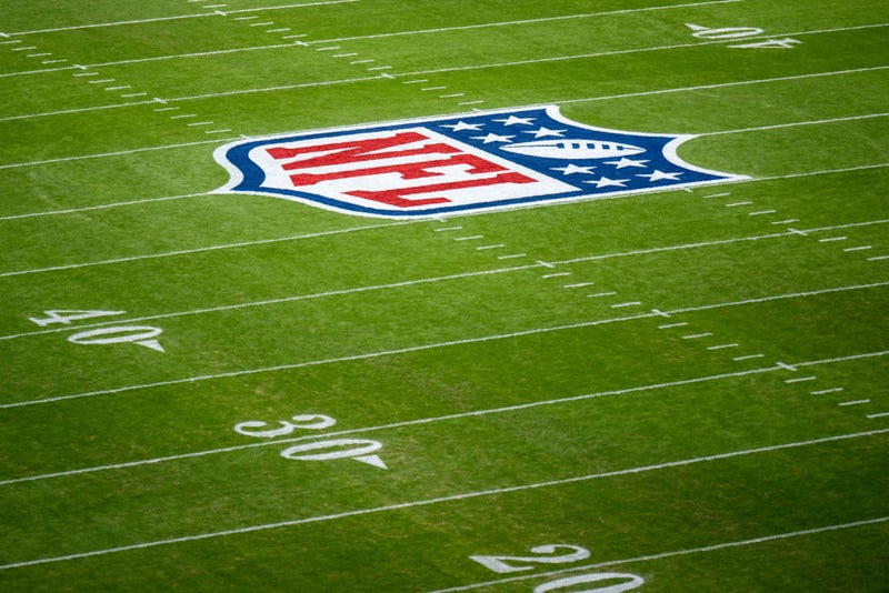 The NFL logo is painted on the field prior to the NFL match between Seattle Seahawks and Tampa Bay Buccaneers at Allianz Arena on November 13, 2022 in Munich, Germany.