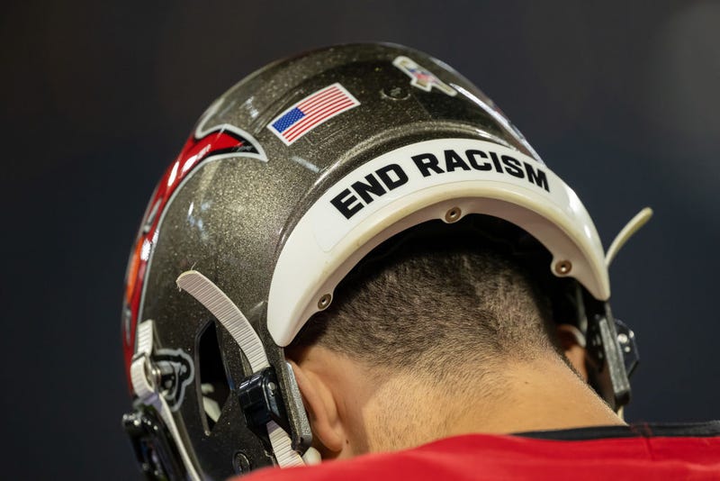 NFL helmet with "End Racism" on it