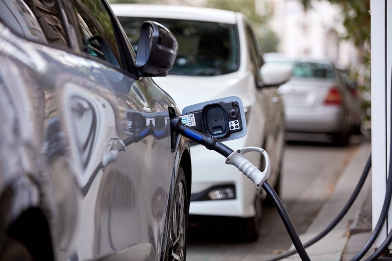 Electric vehicle charging on a public charger. 