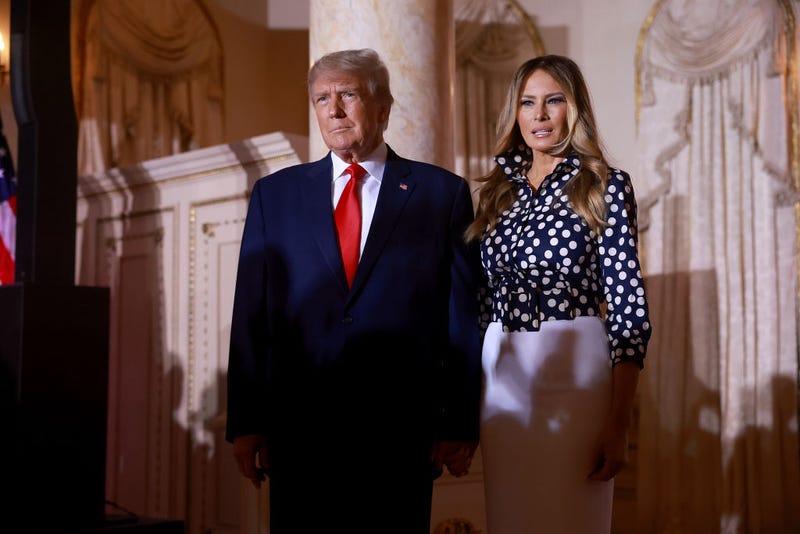 Former U.S. President Donald Trump and former first lady Melania Trump arrive for an event at his Mar-a-Lago home on November 15, 2022 in Palm Beach, Florida. 