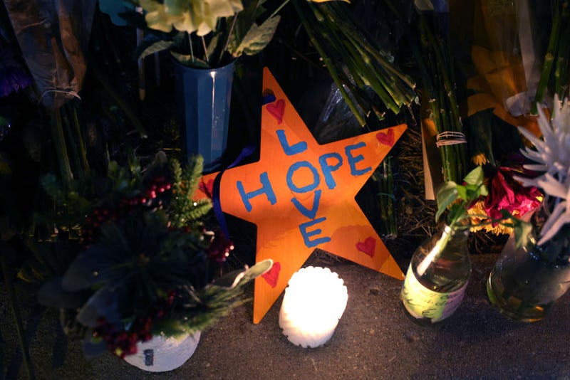 A message to visitors sits at a makeshift memorial near the Club Q nightclub on November 20, 2022 in Colorado Springs, Colorado.