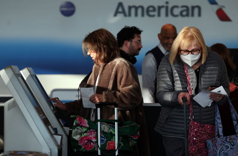 Passengers check-in at Ronald Reagan Washington National Airport on November 23, 2022 in Arlington, Virginia. U.S. airlines are preparing for an increase in passengers over the Thanksgiving holiday weekend with demand expected to reach near pre-pandemic levels. (Photo by Kevin Dietsch/Getty Images)