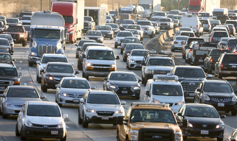 Heavy afternoon traffic moves along the I-5 on November 23, 2022 in Los Angeles, California.