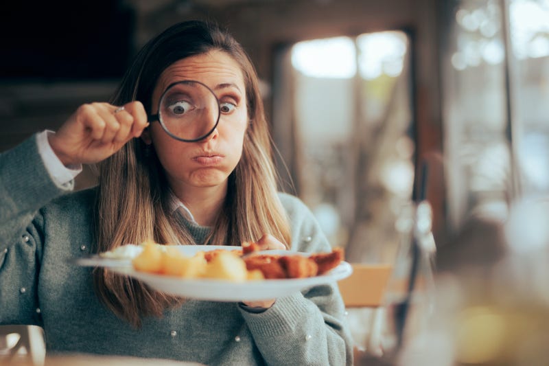 Woman reviewing food