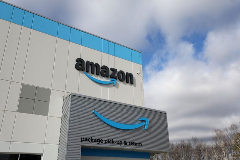 The Amazon logo is displayed on the exterior of an Amazon delivery station on November 28, 2022 in Alpharetta, Georgia. Amazon is offering deep discounts on popular products for Cyber Monday, its busiest shopping day of the year. 