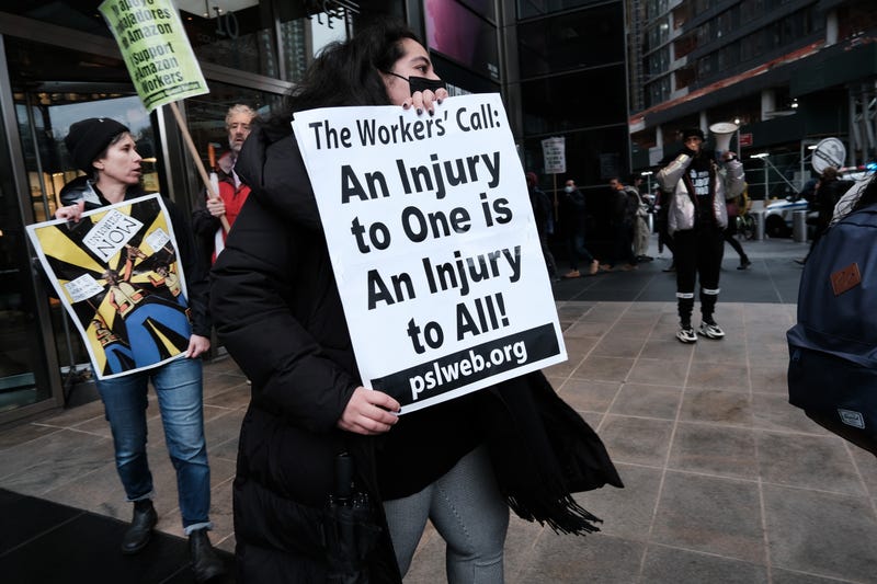 Members of the Amazon Labor Union and others protest outside of the New York Times DealBook Summit as Amazon's CEO, Andy Jassy, will be appearing on November 30, 2022 in New York City. Labor activist Chris Smalls joined the morning rally and protest at Manhattan's Columbus Circle.
