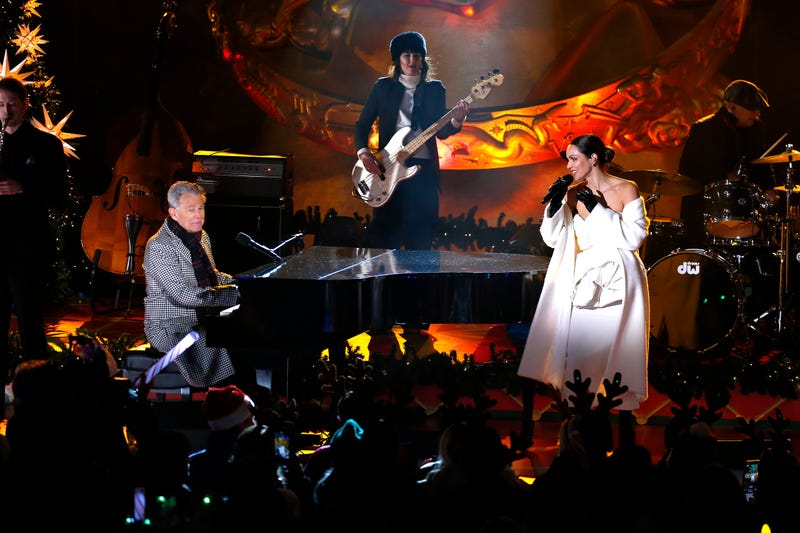 David Foster and Katherine McPhee perform on stage during the 2022 Rockefeller Center Christmas Tree Lighting Ceremony in Nov. 30, 2022