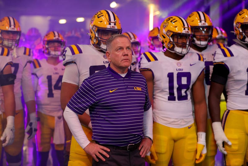 Head coach Brian Kelly of the LSU Tigers stands with his team in the tunnel prior to the SEC Championship game against the Georgia Bulldogs at Mercedes-Benz Stadium on December 03, 2022 in Atlanta, Georgia.