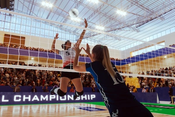 Female volleyball players during a championship match