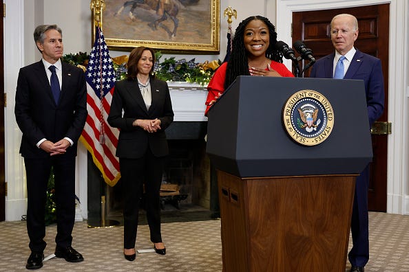 WASHINGTON, DC - DECEMBER 08: Cherelle Griner (3rd L), wife of Olympian and WNBA player Brittney Griner, speaks after U.S. President Joe Biden announced her release from Russian custody, with Secretary of State Anthony Blinken (L) and Vice President Kamala Harris at the White House on December 08, 2022 in Washington, DC. Griner was released as part of a prisoner swap that involved Russian arms dealer Viktor Bout. 