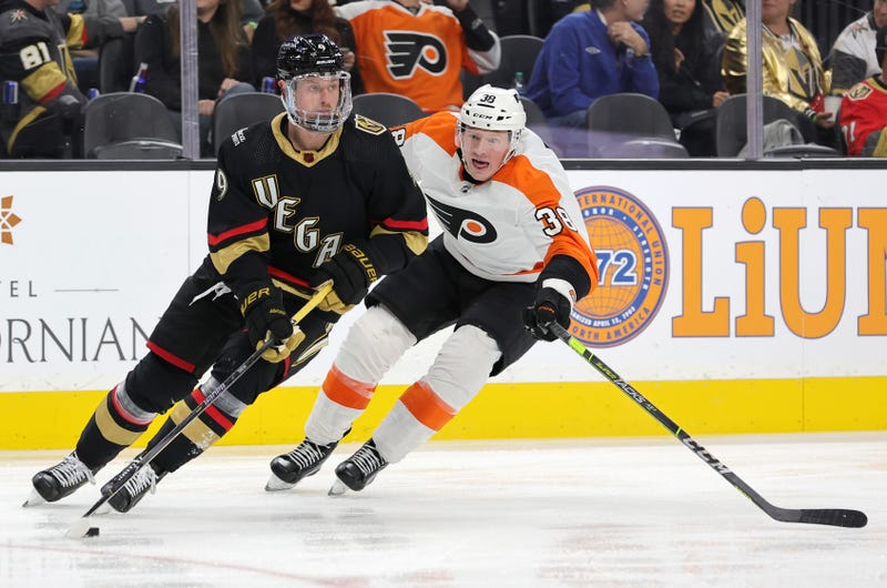 ack Eichel #9 of the Vegas Golden Knights skates with the puck against Patrick Brown #38 of the Philadelphia Flyers in the third period of their game at T-Mobile Arena on December 09, 2022
