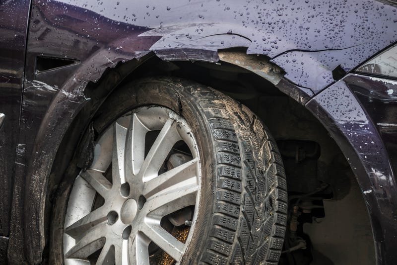 A Midland police officer, along with the help of a bystander, jumped into action on Wednesday and pulled four people to safety after they became trapped in a burning vehicle on U.S. 10.