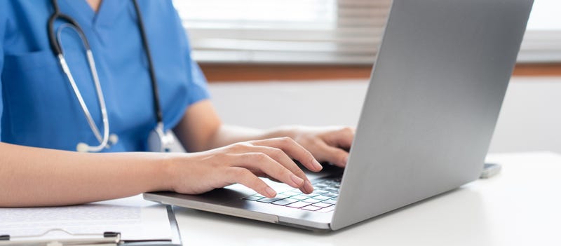 nurse at laptop