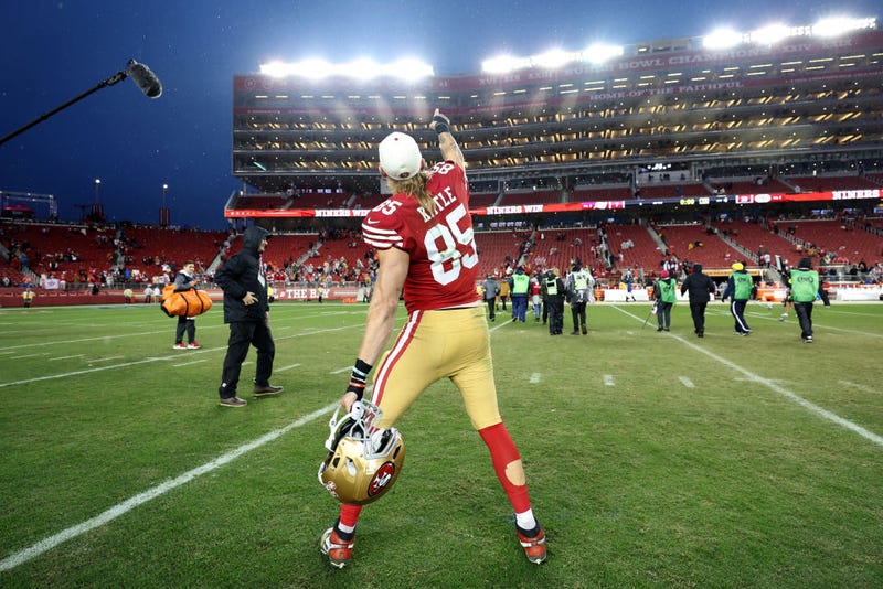 George Kittle #85 of the San Francisco 49ers celebrates after defeating the Tampa Bay Buccaneers 35-7 at Levi's Stadium on December 11, 2022 in Santa Clara, California.