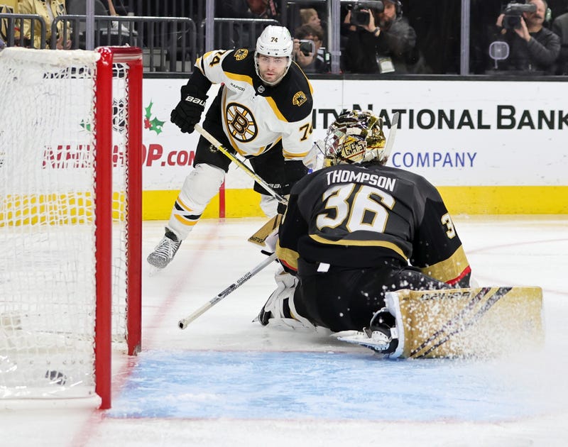ake DeBrusk #74 of the Boston Bruins scores a goal against Logan Thompson #36 of the Vegas Golden Knights in the third period of their game at T-Mobile Arena on December 11, 2022 in Las Vegas.