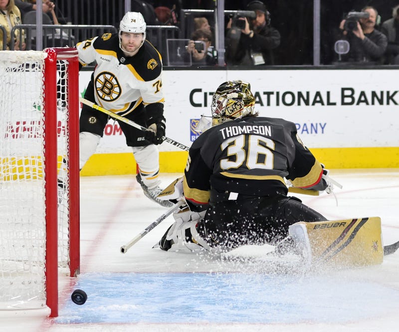 Jake DeBrusk #74 of the Boston Bruins scores a goal against Logan Thompson #36 of the Vegas Golden Knights in the third period of their game at T-Mobile Arena on December 11, 2022 in Las Vegas