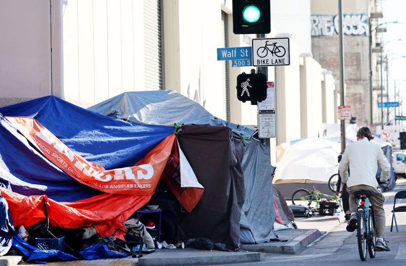 A homeless encampment lines a street in the Skid Row community on December 14, 2022 in Los Angeles, California. 