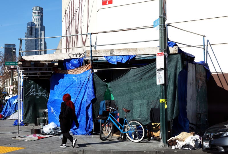 A homeless encampment lines a sidewalk in the Skid Row community on December 14, 2022 in Los Angeles, California.