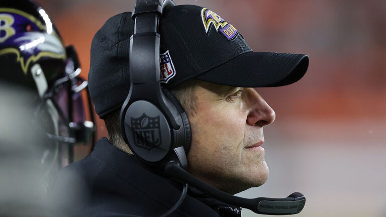 John Harbaugh visibly annoyed by question about QBs in awkward sideline interview