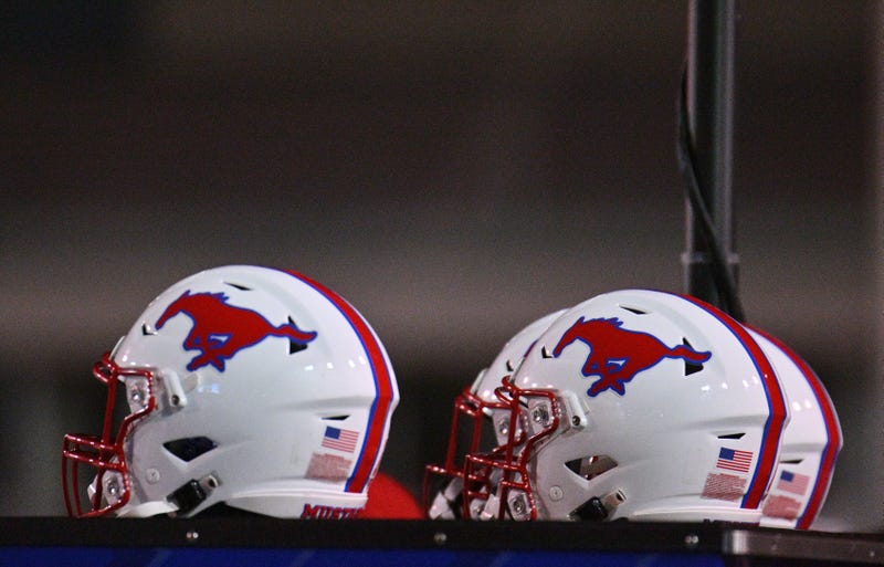 SMU Mustangs helmets are placed on the sideline during the second half of the New Mexico Bowl game between the Mustangs and the Brigham Young Cougars at University Stadium on Dec. 17, 2022, in Albuquerque, New Mexico.