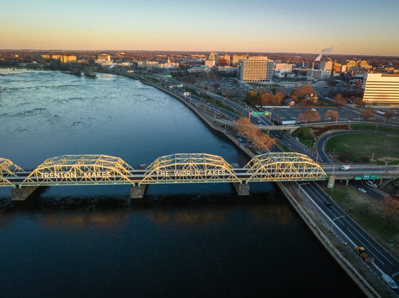 An aerial of the Lower Trenton highway bridge over the Delaware river in Trenton, New Jersey at sunrise.