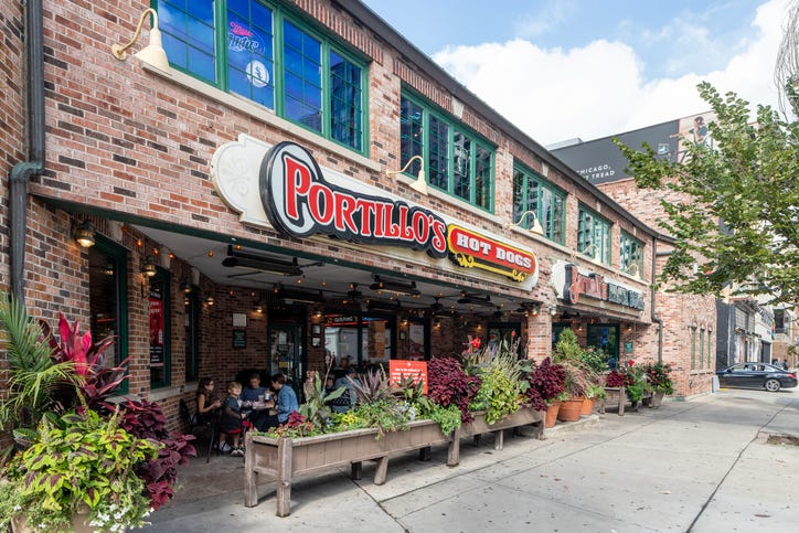 Chicago, IL, USA - October 8, 2021: Portillo's and Bernelli's are a food chain, based out of Chicago, known for their hot dogs, italian beef sandwiches, and other fast food.