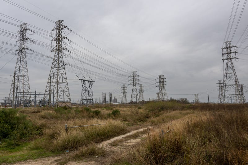 Transmission towers near the CenterPoint Energy facility on Dec. 22, 2022, in Houston, Texas.