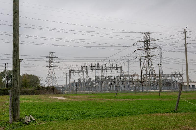 Transmission towers near the Energy Research Park facility on Dec. 22, 2022, in Houston, Texas.