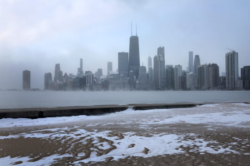 Vapor rises from Lake Michigan near downtown