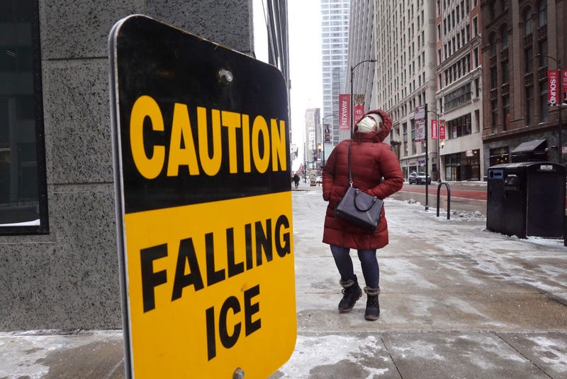  A pedestrian walks through downtown as temperatures hover in the negative single-digits on December 23, 2022 in Chicago, Illinois. Sub-zero temperatures are expected to grip the city for the next couple of days with wind chill temperature dipping as low as -40 degrees. (Photo by Scott Olson/Getty Images)