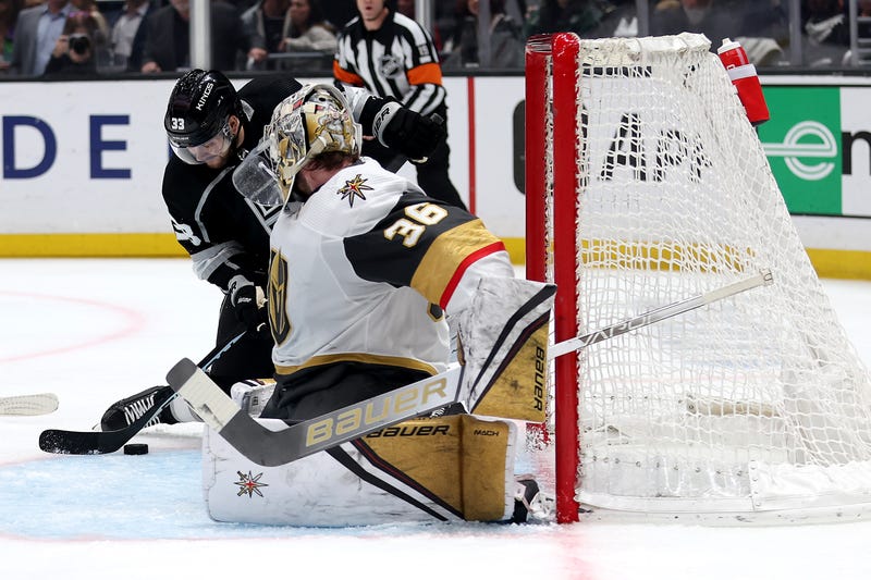 Viktor Arvidsson #33 of the Los Angeles Kings defends against William Karlsson #71 of the Vegas Golden Knights during the third period of a game at Crypto.com Arena on December 27, 2022