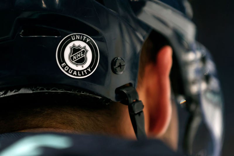 An NHL logo displaying unity and equality is seen on the helmet on Jordan Eberle #7 of the Seattle Kraken as he warms up before the game against the Calgary Flames at Climate Pledge Arena on December 28, 2022 in Seattle, Washington.