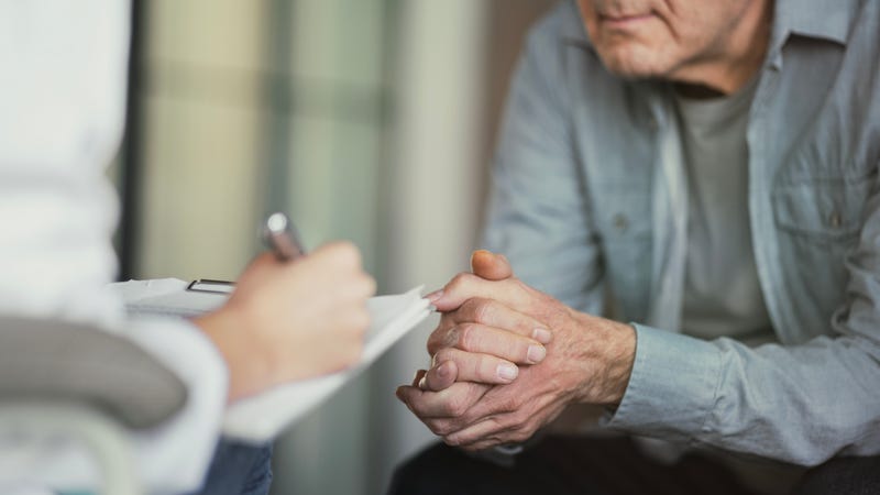 man talking with doctor