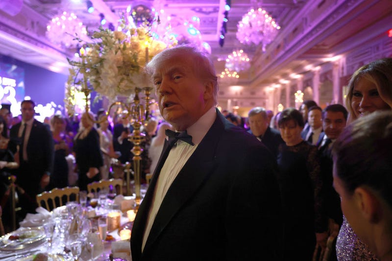 Former U.S. President Donald Trump greets people as he arrives for a New Years event at his Mar-a-Lago home on December 31, 2022 in Palm Beach, Florida. Trump continues to run for a second term as the President of the United States. (Photo by Joe Raedle/Getty Images)