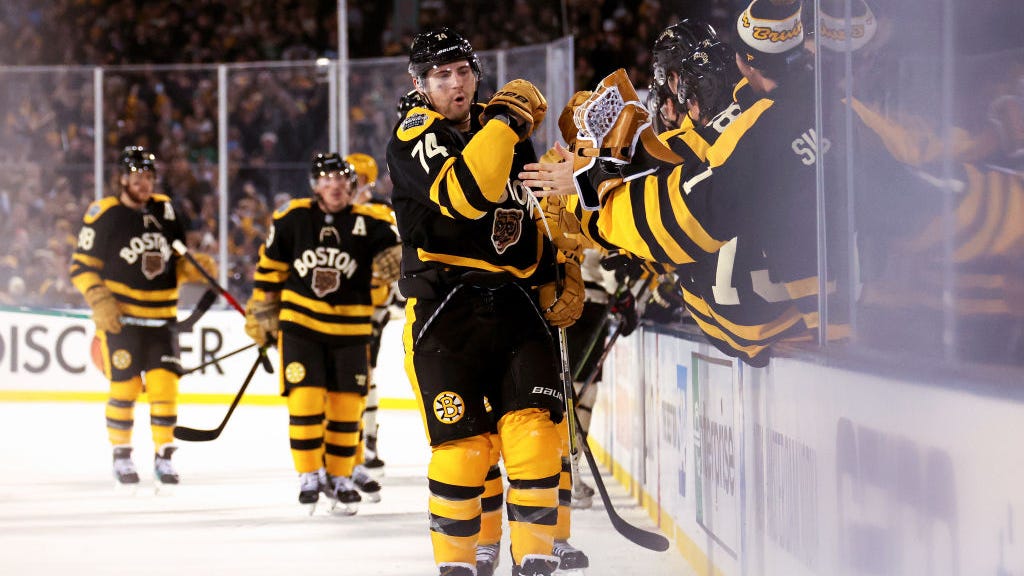 Jake DeBrusk’s two third-period goals lift Bruins to Winter Classic win over Penguins