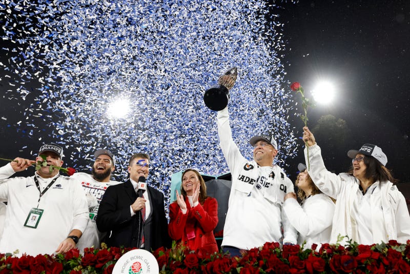 Head coach James Franklin of the Penn State Nittany Lions hoists the Leishman Trophy after defeating the Utah Utes in the 2023 Rose Bowl Game on January 2 in Pasadena, California. The Penn State Nittany Lions defeated the Utah Utes 35-21.
