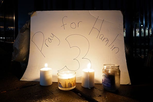 A vigil is displayed at the University of Cincinnati Medical Center for football player Damar Hamlin of the Buffalo Bills after he collapsed following a tackle during the game against the Cincinnati Bengals and was transported by ambulance to the hospital on January 03, 2023 in Cincinnati, Ohio.