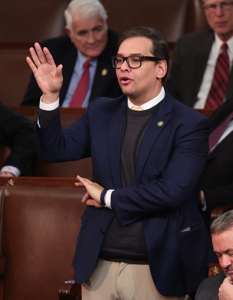 U.S. Rep.-elect George Santos (R-NY) holds an "okay" hand sign as he casts his vote in the House Chamber during the third day of elections for Speaker of the House at the U.S. Capitol Building on January 05, 2023 in Washington, DC.