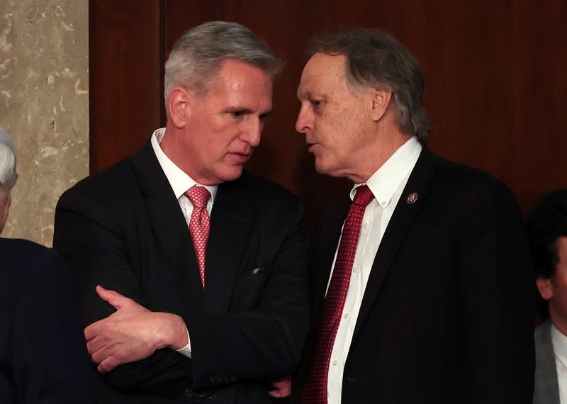 U.S. House Republican Leader Kevin McCarthy (R-CA) (L) talks to Rep.-elect Andy Biggs (R-AZ) in the House Chamber during the third day of elections for Speaker of the House at the U.S. Capitol Building on January 5, 2023 in Washington, D.C. The House of Representatives is meeting to vote for the next Speaker after House Republican Leader Kevin McCarthy (R-CA) failed to earn more than 218 votes on several ballots; the first time in 100 years that the Speaker was not elected on the first ballot. 
